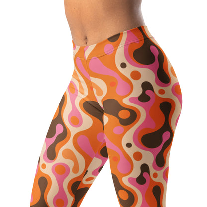 Retro lava lamp leggings with wavy blob print in orange, pink, brown, and cream