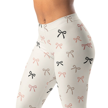 Modern bow print leggings with small scattered bows and athletic style