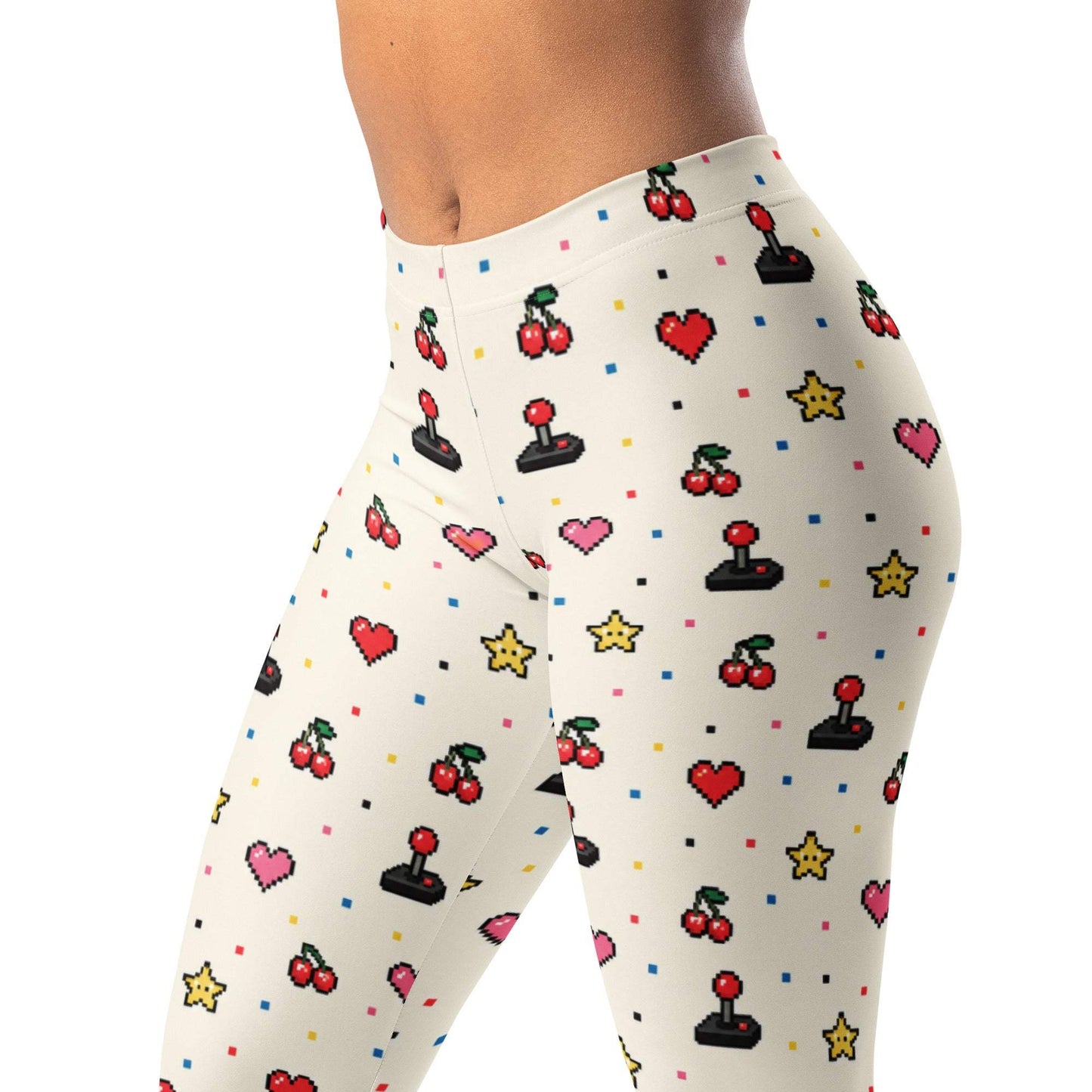 Arcade-inspired leggings with joysticks, stars, cherries, hearts, and pixel dots