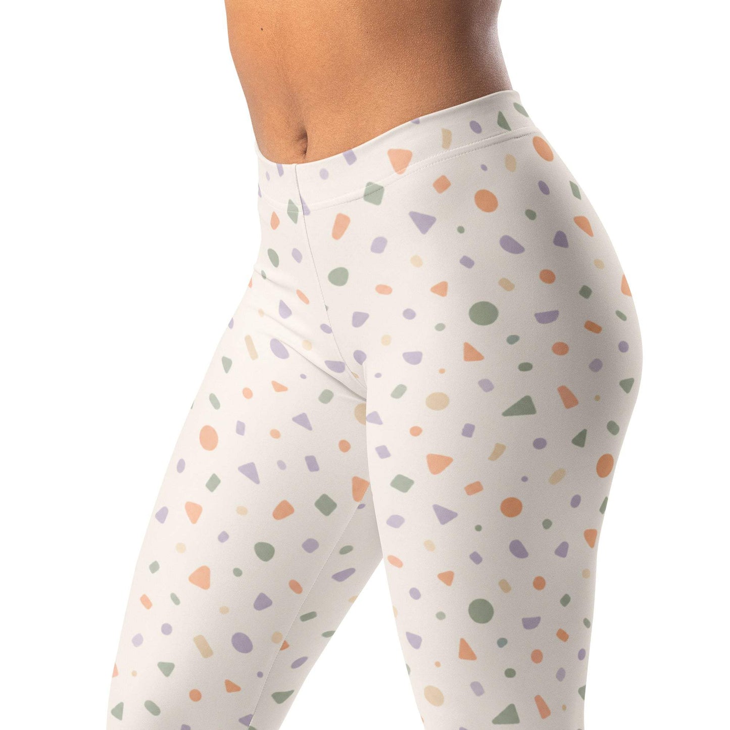 Soft geometric confetti leggings in peach, sage, lavender, and cream