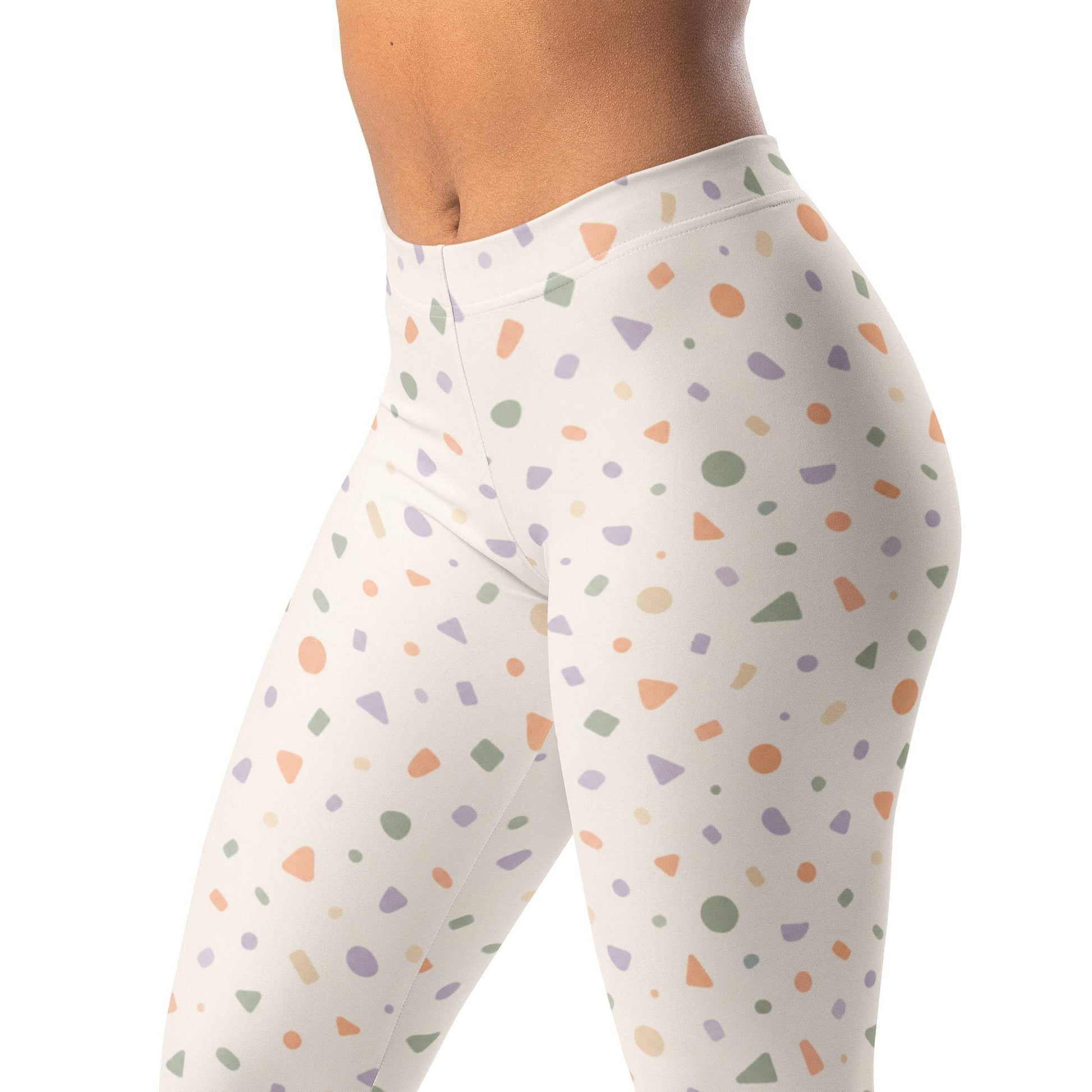 Soft geometric confetti leggings in peach, sage, lavender, and cream