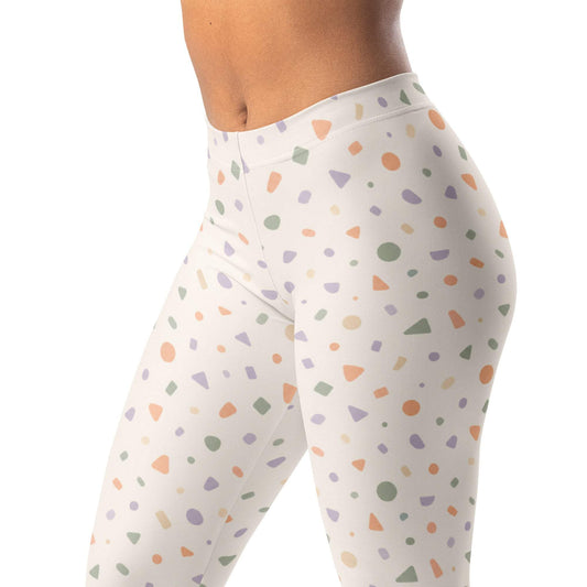 Soft geometric confetti leggings in peach, sage, lavender, and cream