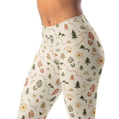 Running trail icons leggings with shoe prints, arrows, trees, and sunbursts