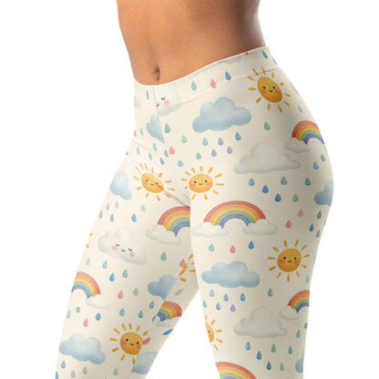 Sun shower leggings with playful sun, rain, and rainbow design on soft cream background