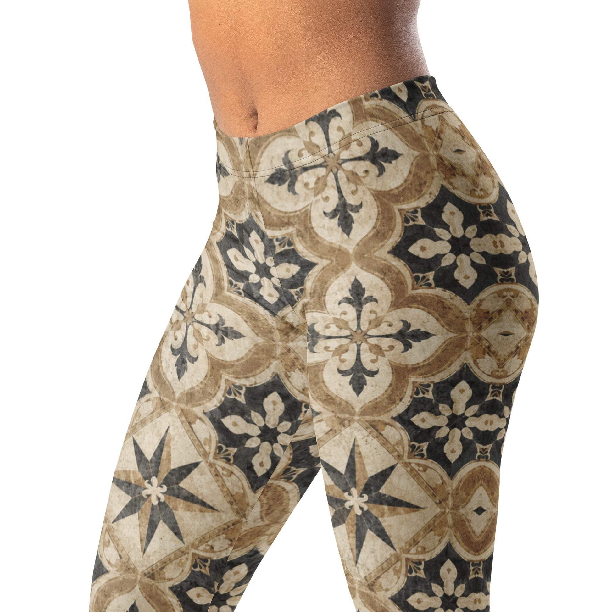 Ancient tile neutral leggings with old-world motifs in tan, charcoal, and cream