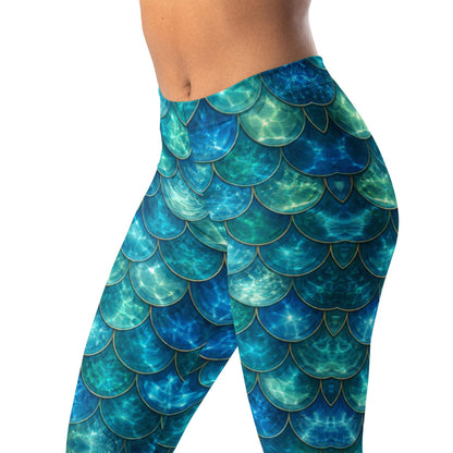 Ocean shimmer scale leggings with blue-green pattern and subtle light effects