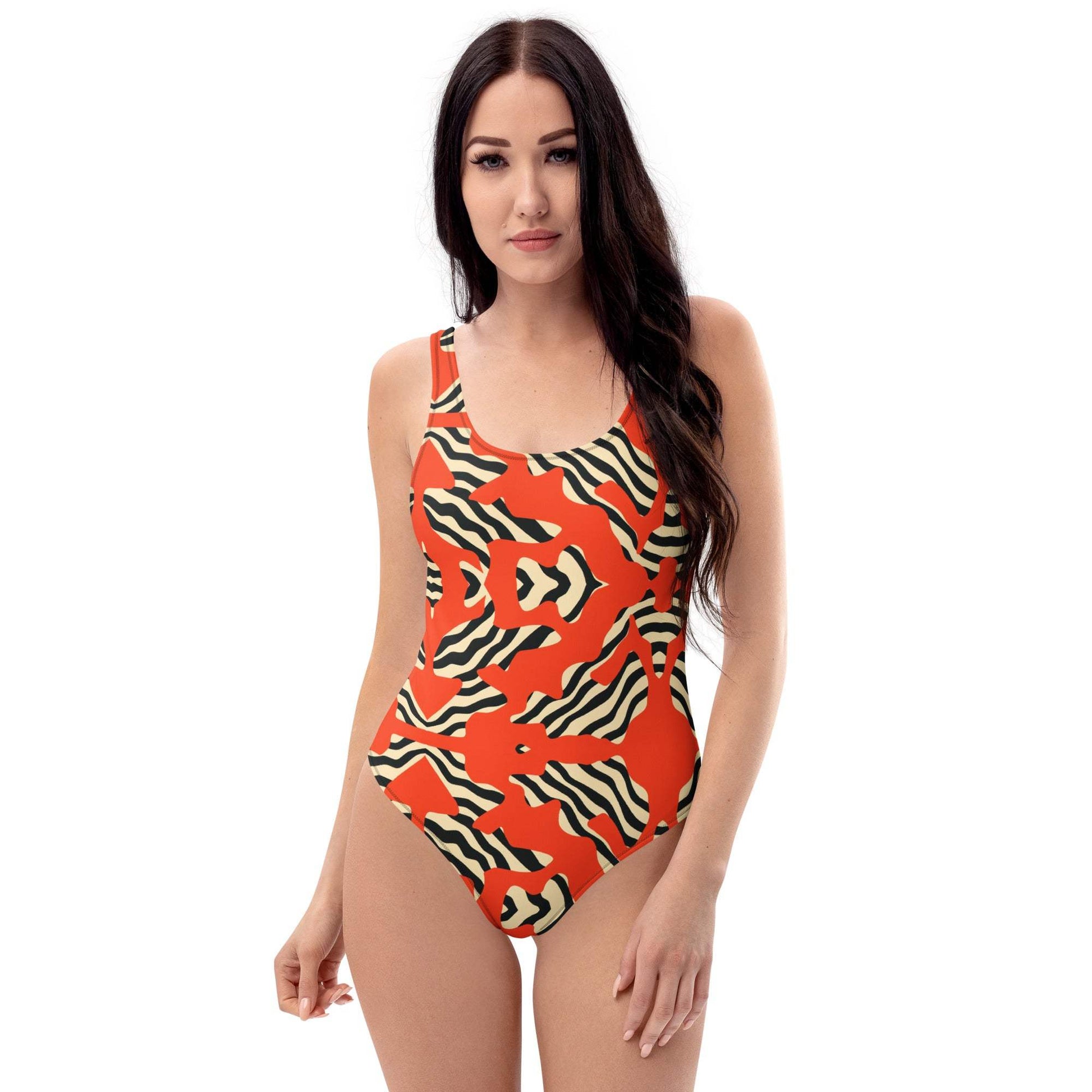 Zebra Print One-Piece Swimsuit - Bold black and white design, perfect for standing out at the beach