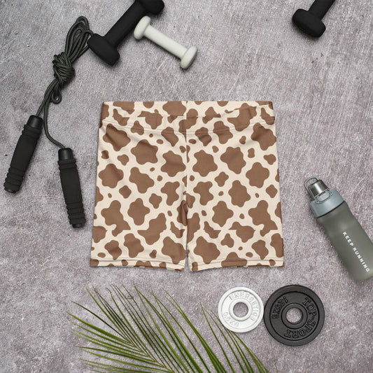 Minimal cow print biker shorts with soft brown patches