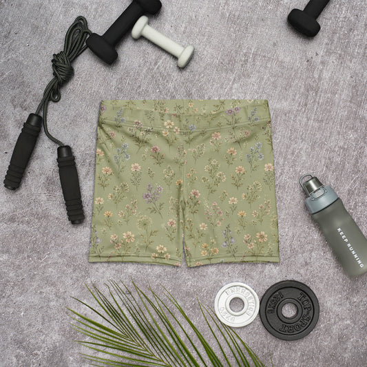 Vintage wildflower biker shorts on dusty sage background